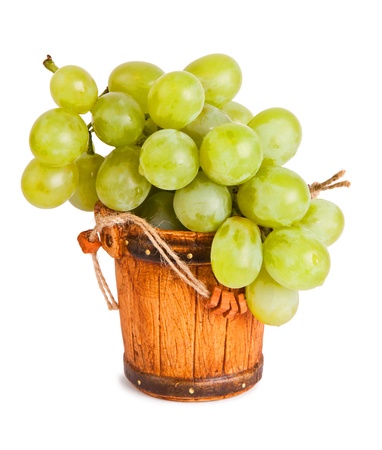 Grapes in a bucket  isolated on a white backgroundの写真素材