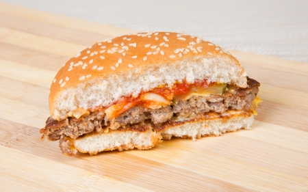 Delicious hamburger with lots of cheddarの写真素材