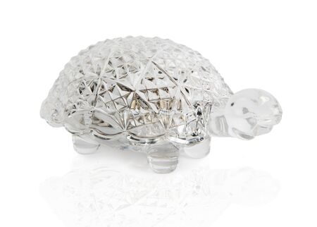 Crystal casket in the form of a turtle  Beautiful crystal casket in the form of a turtle for jewelry isolated on a white backgroundの写真素材