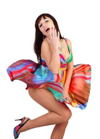 The beautiful girl in a fluttering dress isolated on a white backgroundの写真素材