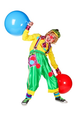 Funny clown with balls in studio isolated on white backgroundの写真素材