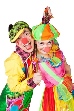 Two clowns smiling isolated over a white backgroundの写真素材