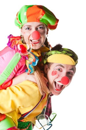 Two smiling clowns  isolated over a white backgroundの写真素材