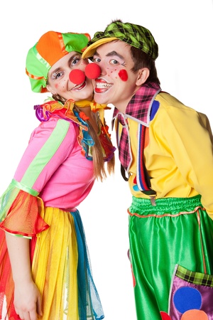 Two smiling clowns  isolated over a white backgroundの写真素材