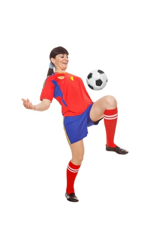 girl with soccer ball isolated on white backgroundの写真素材