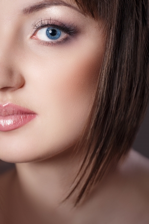 Close-up portrait of young beautiful woman with clear make-up and perfect healthy skinの写真素材