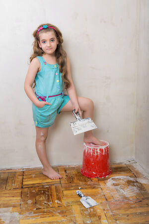 bright picture of girl making repairing worksの写真素材