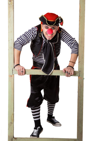 Clown in a pirate suit isolated on a white backgroundの写真素材