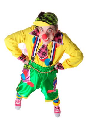 Funny clown with a flower from a balloon isolated on white backgroundの写真素材