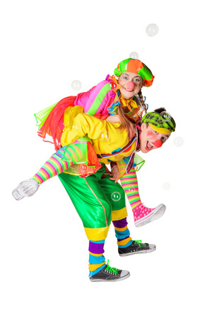 Two smiling clowns isolated over a white backgroundの写真素材