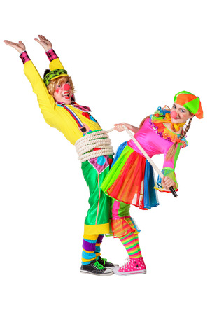 Two smiling clowns isolated over a white backgroundの写真素材