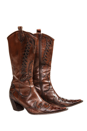 cowboy boots isolated on a white backgroundの写真素材