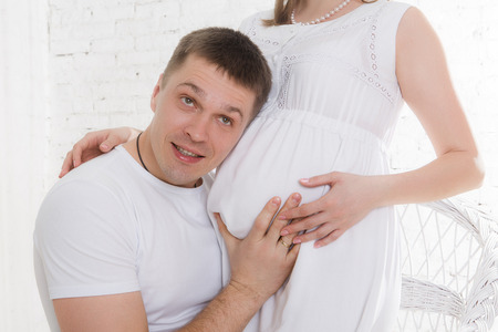 Man and his pregnant wifeの写真素材