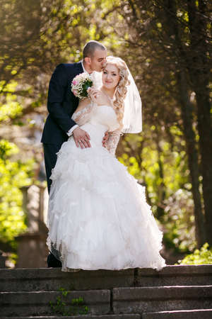groom and the bride during walk in their wedding dayの写真素材