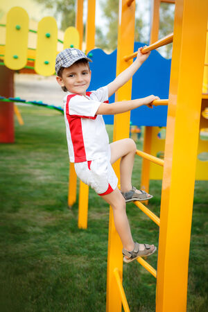 Happy games - pretty boy on the playgroundの写真素材