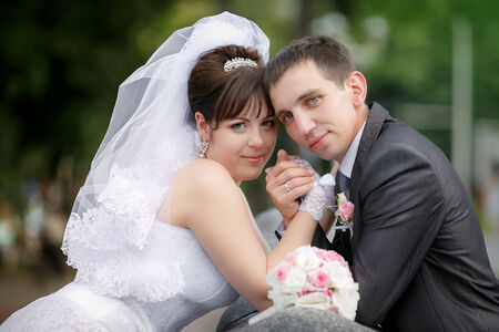 Portrait of the groom and the bride in their wedding dayの写真素材