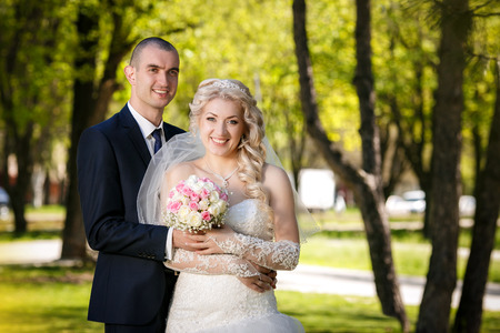 Happy bride and groom on their weddingの写真素材