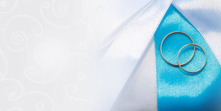 Two weddings rings on a background a fabricの写真素材