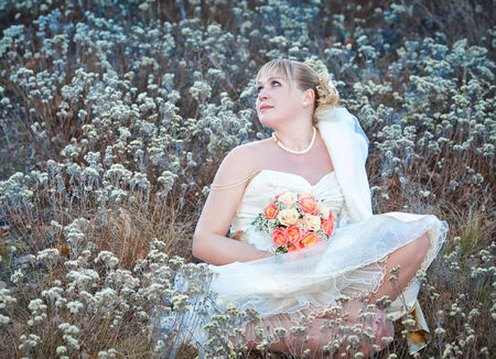 portrait of bride  with  wedding flowersの写真素材