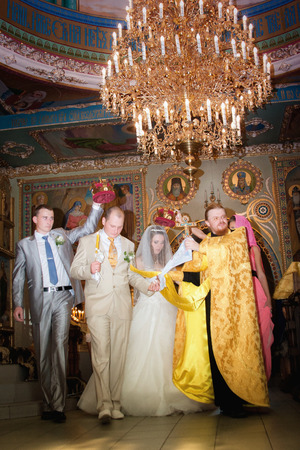 Bride and groom at the church during a wedding ceremonyの写真素材