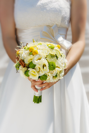 Wedding bouquet in bride's handsの写真素材