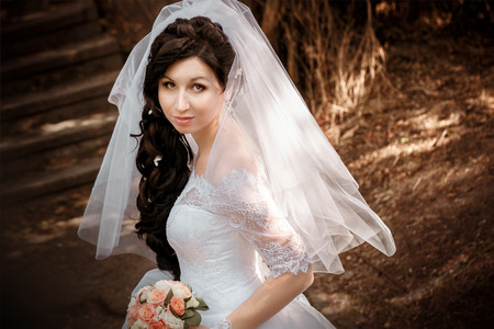 Portrait of pretty bride with veilの写真素材