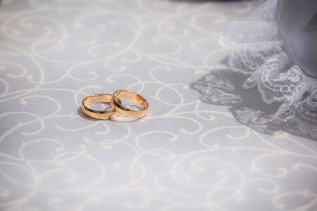 Two weddings rings on a background a fabricの写真素材