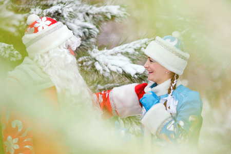 Russian Christmas characters: Ded Moroz (Father Frost) and Snegurochka (Snow Maiden) with gifts bagの写真素材