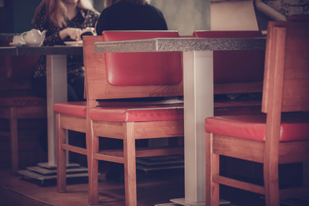 Two people enjoy spending the time in cafeの写真素材