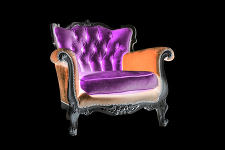 Violet and orange armchair  on the black backgroundの写真素材