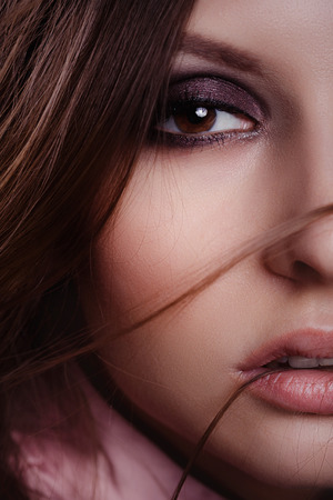 Portrait of pretty young woman in the studioの写真素材