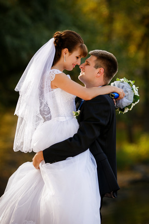 Happy bride and groom on their weddingの写真素材