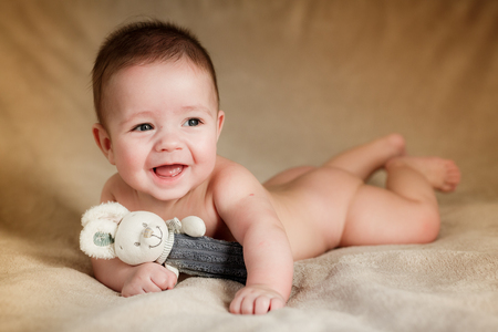 Portrait of newborn baby is lying on the blanketの写真素材