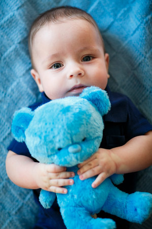 Portrait of newborn baby is lying on the blanketの写真素材