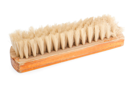 Brown wooden brush isolated on white background.の写真素材