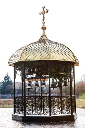 Small bell tower with a bellの写真素材