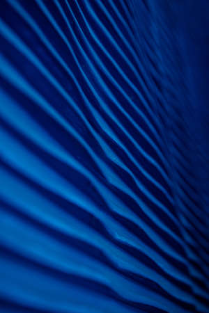 Decorative background blue color, striped texture upper and lower gradient. Wallpaper. Art. Design.の写真素材