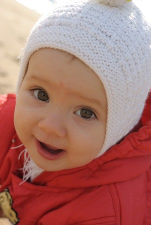 The child in red overallsの写真素材