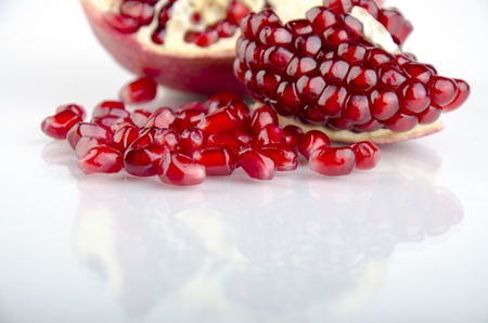 grain pomegranate on a white backgroundの写真素材