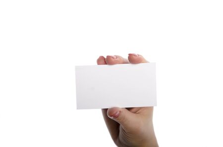 Close-up of an empty business card in a womanの写真素材