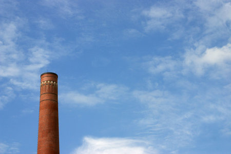 chimney against blue skyの写真素材