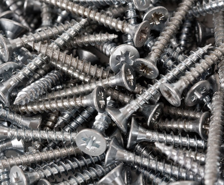 Close-up studio shot of lots of wood screws