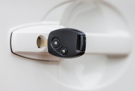 Car keys left in a lockの写真素材