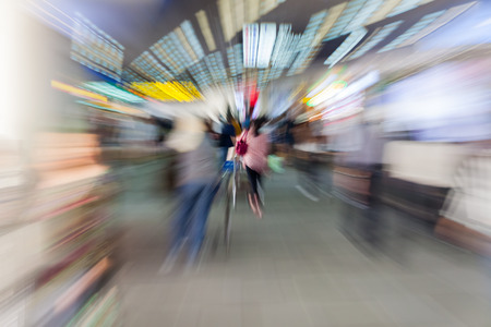 Abstract Blur Background : Airport Check-In Counters With Passengers And Crowd Control Barriers With Bokehのeditorial素材