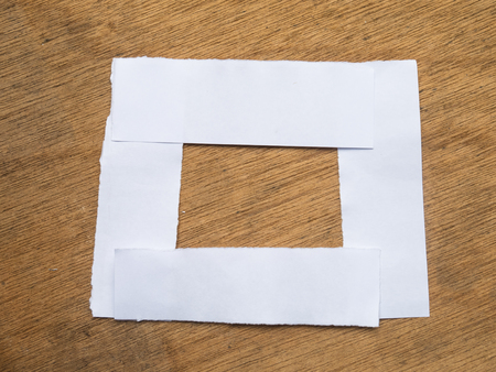 Paper texture. paper sheet on woodの写真素材