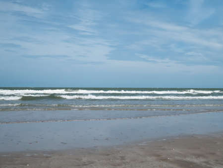 Sky, white clouds, sea and sand Cha-Am beach thailandの写真素材