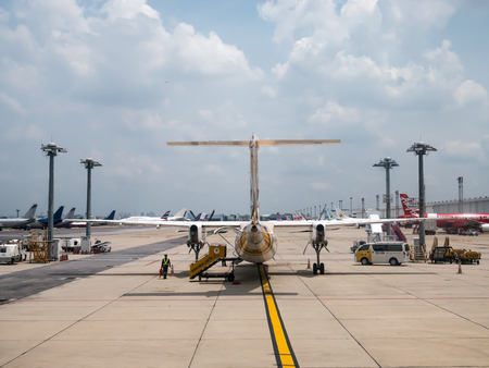 Bangkok - May 31: Don Muang Airport on May 31, 2016 the a plane Passengers waiting to board a flight documentation. Are available at Don Muang Airport in Bangkok, Thailand.のeditorial素材