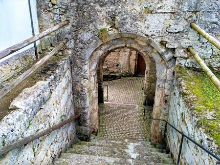 Old stone stairs and ancient wall architectureの写真素材