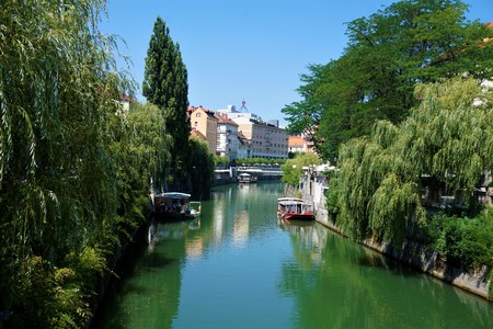 View over calm Ljubljanica river in the city center of Ljubljana, Sloveniaの写真素材