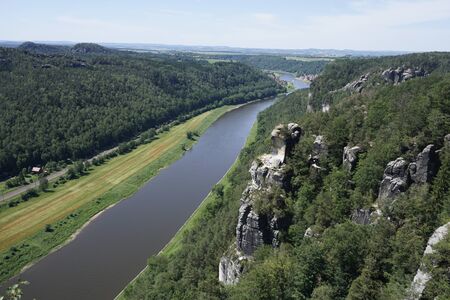 Beautiful view from the Bastei area to Stadt Wehlen in Saxon Switzerland, Germanyの写真素材